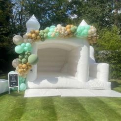 white adult bouncy slide castle 15 x 15 with decorations hire UK