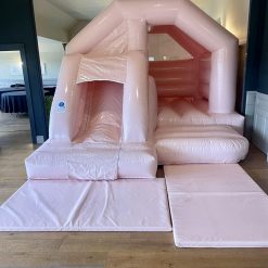 Peach bouncy castle for hire London and Kent