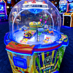 Colorful Treasure Dome arcade prize machine with a clear dome housing spinning toys and blue LED lights.
